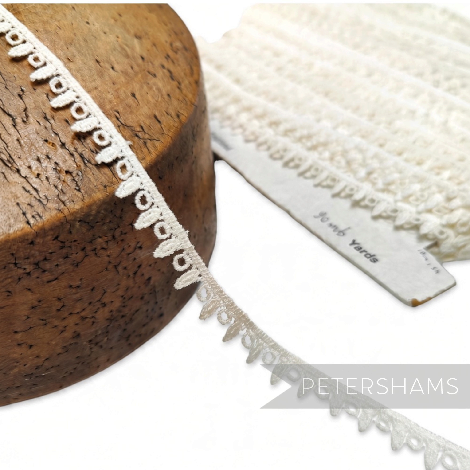 Petershams Millinery Supplies vintage 1950s ivory cotton Nottingham guipure lace trim with circle and droplet design