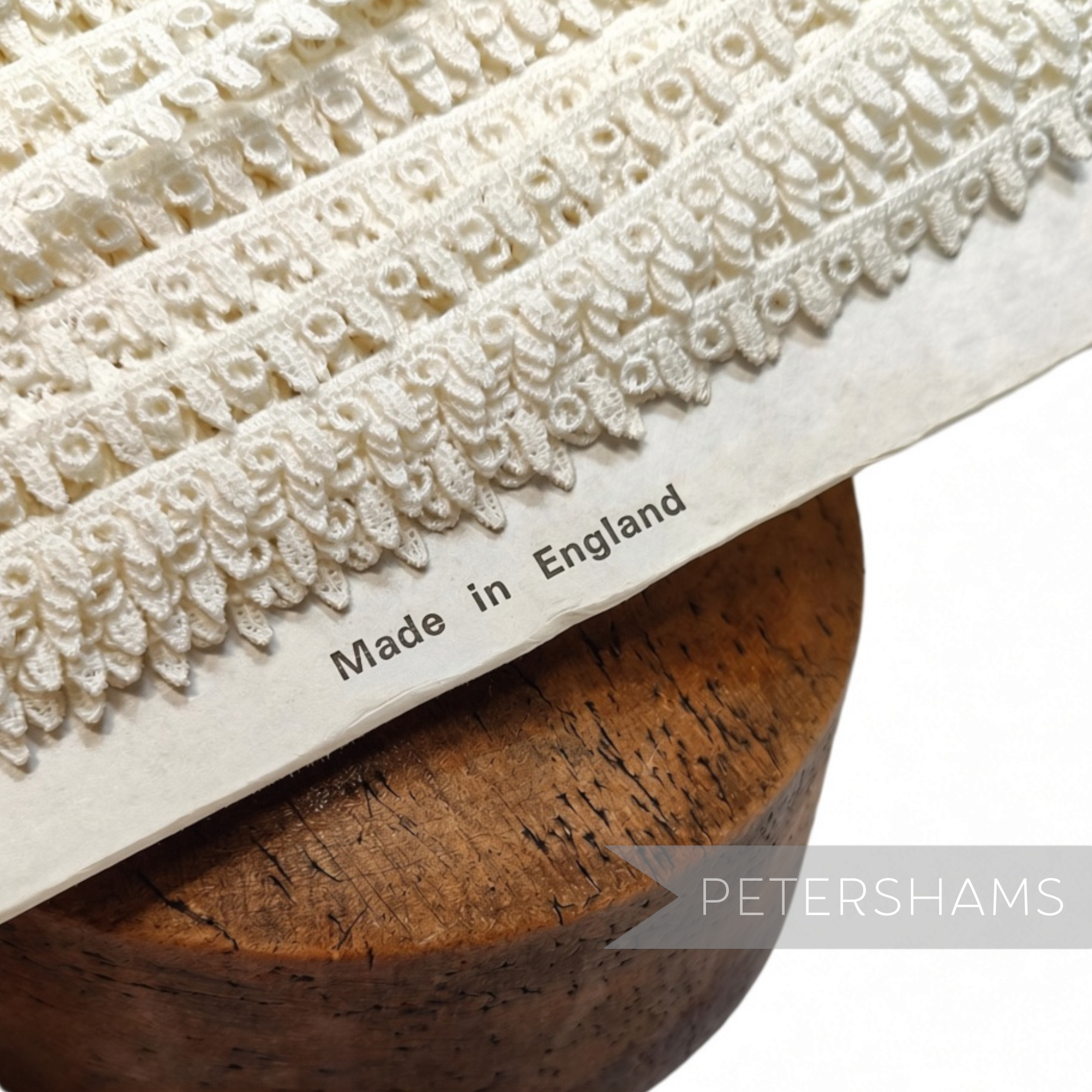 Petershams Millinery Supplies vintage 1950s ivory cotton Nottingham guipure lace trim with circle and droplet design