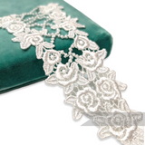 Petershams Millinery Supplies vintage off-white V-shaped guipure lace floral rose motif for bridal headpieces.