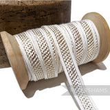 Petershams Millinery Supplies vintage 1940s Nouveaute white and gold lurex lattice insertion trim on a wooden spool