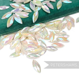Petershams Millinery Supplies vintage 1940s marquise jewel sequins with iridescent finish on green velvet fabric
