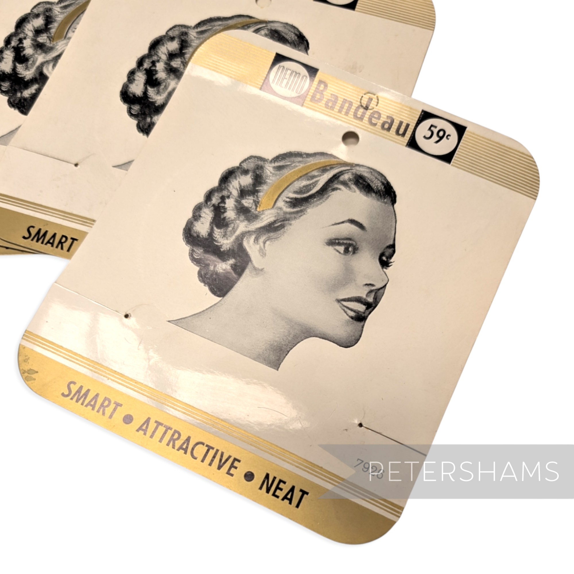 Petershams Millinery Supplies vintage metal toothed bun combs on original 1950s illustrated display cards