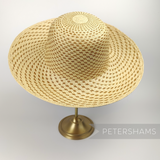 Petershams Millinery Supplies vintage Ecuador Panama straw capeline hat body with a fine spiral weave pattern.