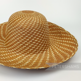 Petershams Millinery Supplies vintage Ecuador Panama straw capeline hat body with a fine spiral weave pattern.