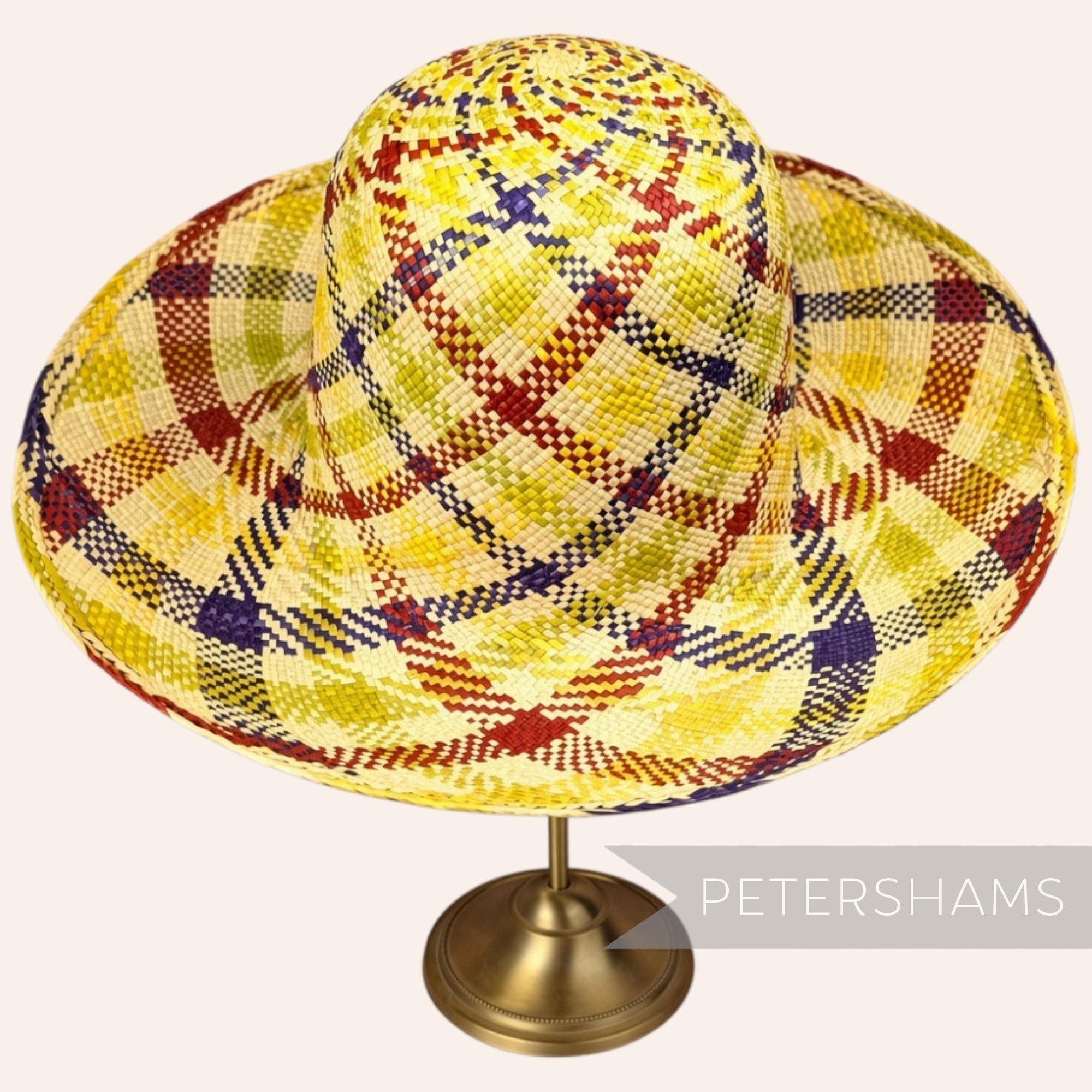Petershams Millinery Supplies vintage Ecuador Panama straw capeline hat body with a multi-tone spiral swirl pattern.