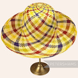 Petershams Millinery Supplies vintage Ecuador Panama straw capeline hat body with a multi-tone spiral swirl pattern.