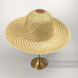 Petershams Millinery Supplies vintage Ecuador Panama straw capeline hat body with a fine spiral weave pattern.