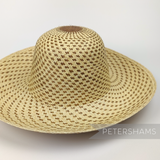 Petershams Millinery Supplies vintage Ecuador Panama straw capeline hat body with a fine spiral weave pattern.