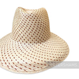 Petershams Millinery Supplies vintage Ecuador toquilla straw capeline with a spiral dash pattern and partially blocked crown.