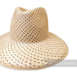 Petershams Millinery Supplies partially blocked vintage Ecuador toquilla straw capeline with a spiral dash pattern.