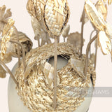 Petershams Millinery Supplies vintage 1970s paper-wrapped wired flower stems in brown, used for craft projects.