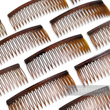 Petershams Millinery Supplies vintage 1950s/60s brown plastic hair comb, 7.5cm wide, designed for short hair.