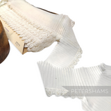 Petershams Millinery Supplies vintage 1950s white pleated synthetic trim with intricate guipure lace edge