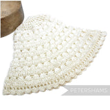 Petershams Millinery Supplies vintage 1970s cream laminated raffia crochet flare hat body for millinery projects.