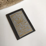 Petershams Millinery Supplies antique Kirby Beard egg eyed sewing needles in a black paper packet with gold label
