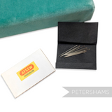 Petershams Millinery Supplies vintage 1950s Abel Morrall sewing needles in a paper packet with nine steel needles.