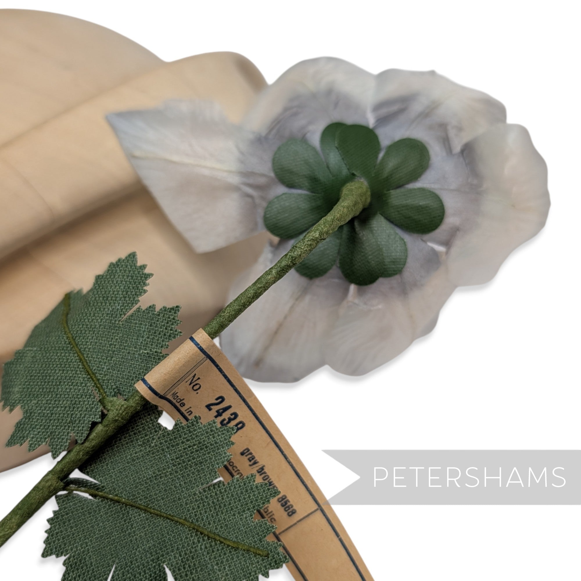 Petershams Millinery Supplies vintage 1960s German silk anemone flower mount with green wired stem and paper label