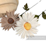 Petershams Millinery Supplies vintage 1950s silk daisy flower heads with fuzzy centers and wired green stems.