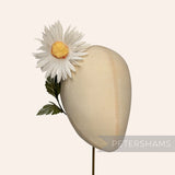 Petershams Millinery Supplies vintage 1950s white silk daisy flower with fuzzy yellow center on a wired green stem.