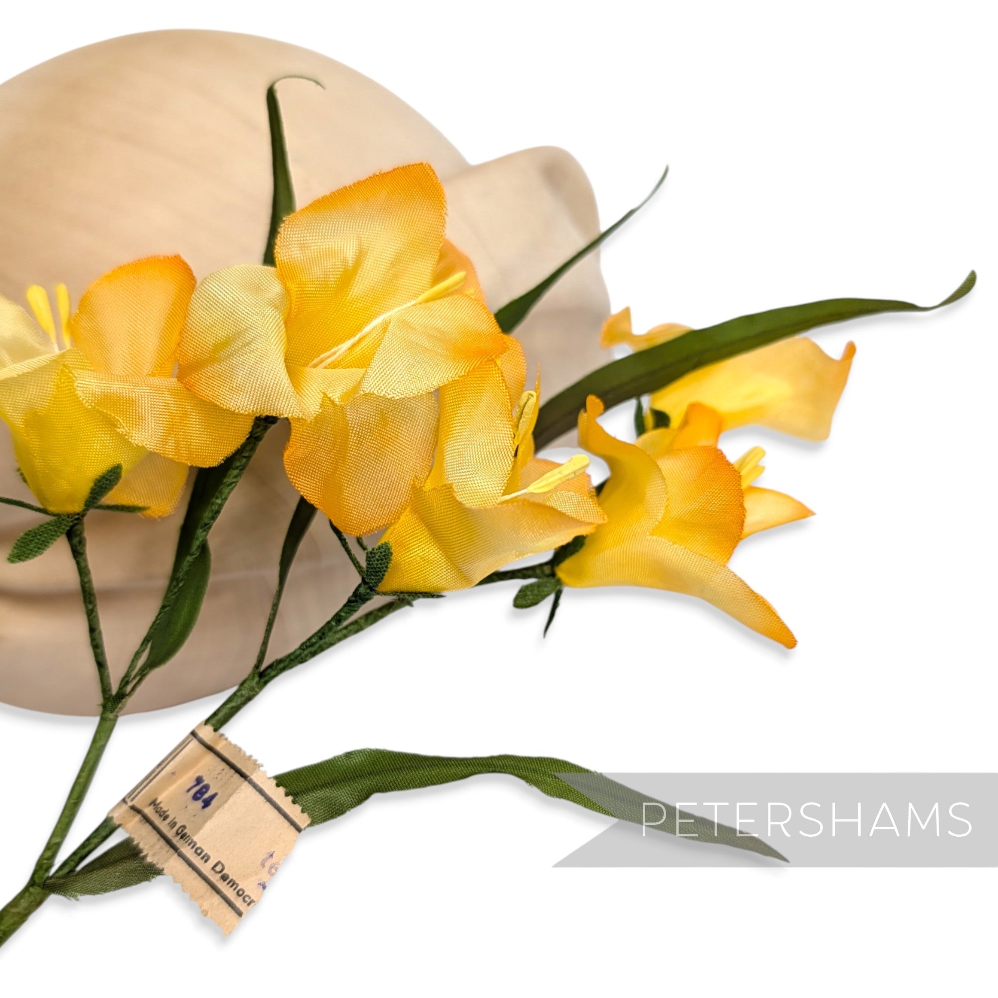 Petershams Millinery Supplies vintage 1960s German silk freesia flower mount in yellow with green wired leaves