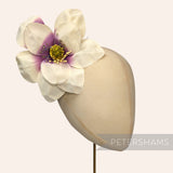 Petershams Millinery Supplies vintage ivory and plum silk magnolia hat flower on a millinery head block