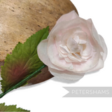 Petershams Millinery Supplies vintage 1960s silk rosebud in pale pink with green wired leaves and stem.