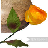 Petershams Millinery Supplies vintage 1960s silk rosebud in vibrant orange with green wired leaves on a long stem
