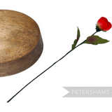Petershams Millinery Supplies vintage 1960s red silk rosebud with wired green leaves and stem on a white background