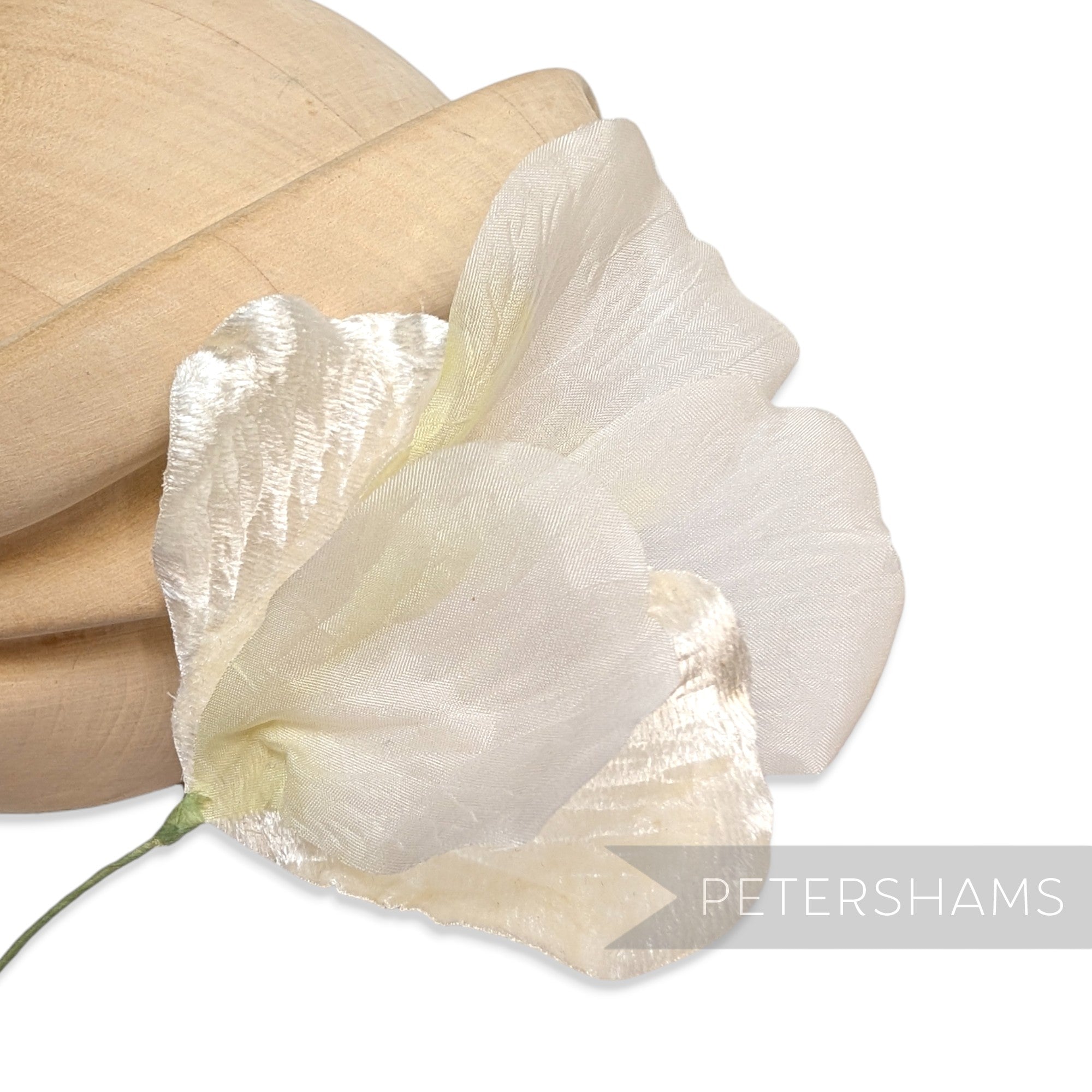Petershams Millinery Supplies vintage Hanabira wired silk and velvet flower petals in cream on a wooden millinery block