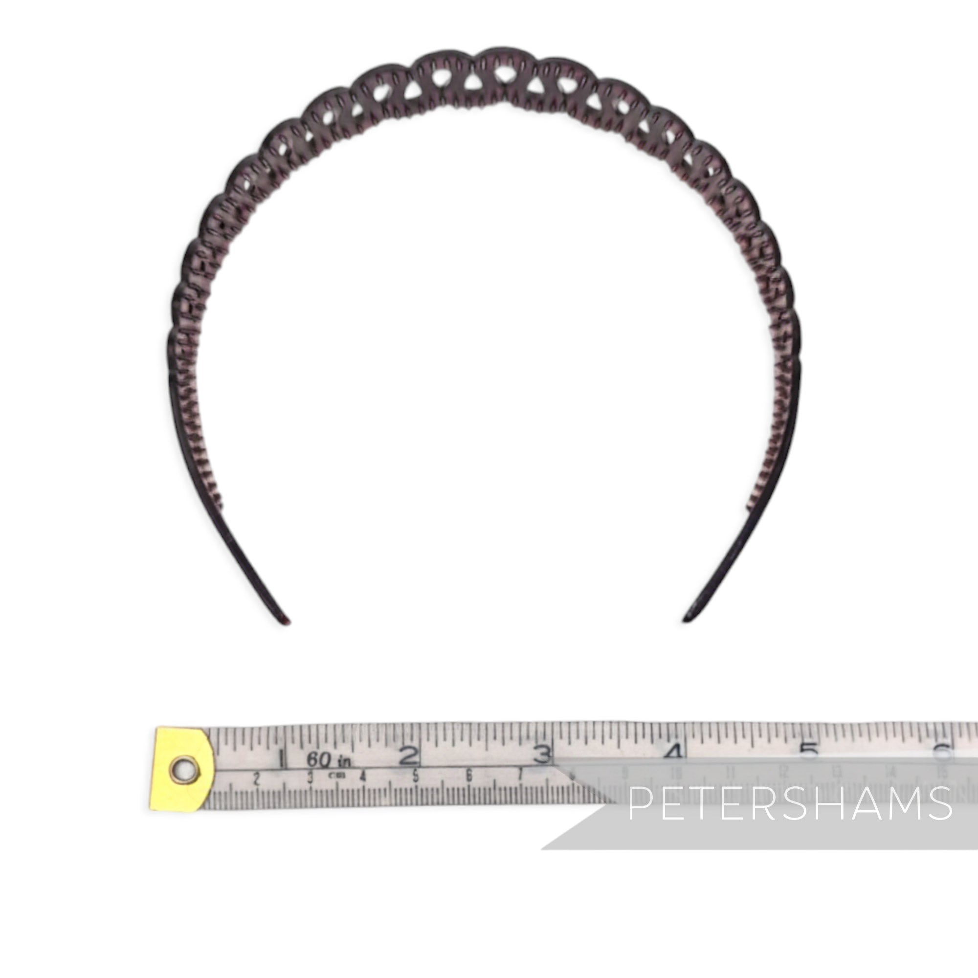 Petershams Millinery Supplies vintage 1980s dark tortoise shell plastic headband for children with squiggle design and tooth grips.