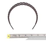 Petershams Millinery Supplies vintage 1980s dark tortoise shell plastic headband for children with squiggle design and tooth grips.