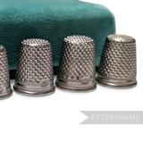 Petershams Millinery Supplies vintage German steel sewing thimbles with dimpled texture in various sizes