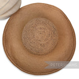 Petershams Millinery Supplies vintage toquilla straw capeline hat with a knitted crown and wide brim, top view.