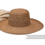 Petershams Millinery Supplies vintage Ecuador toquilla straw capeline hat body with a knitted ruffle crown detail.