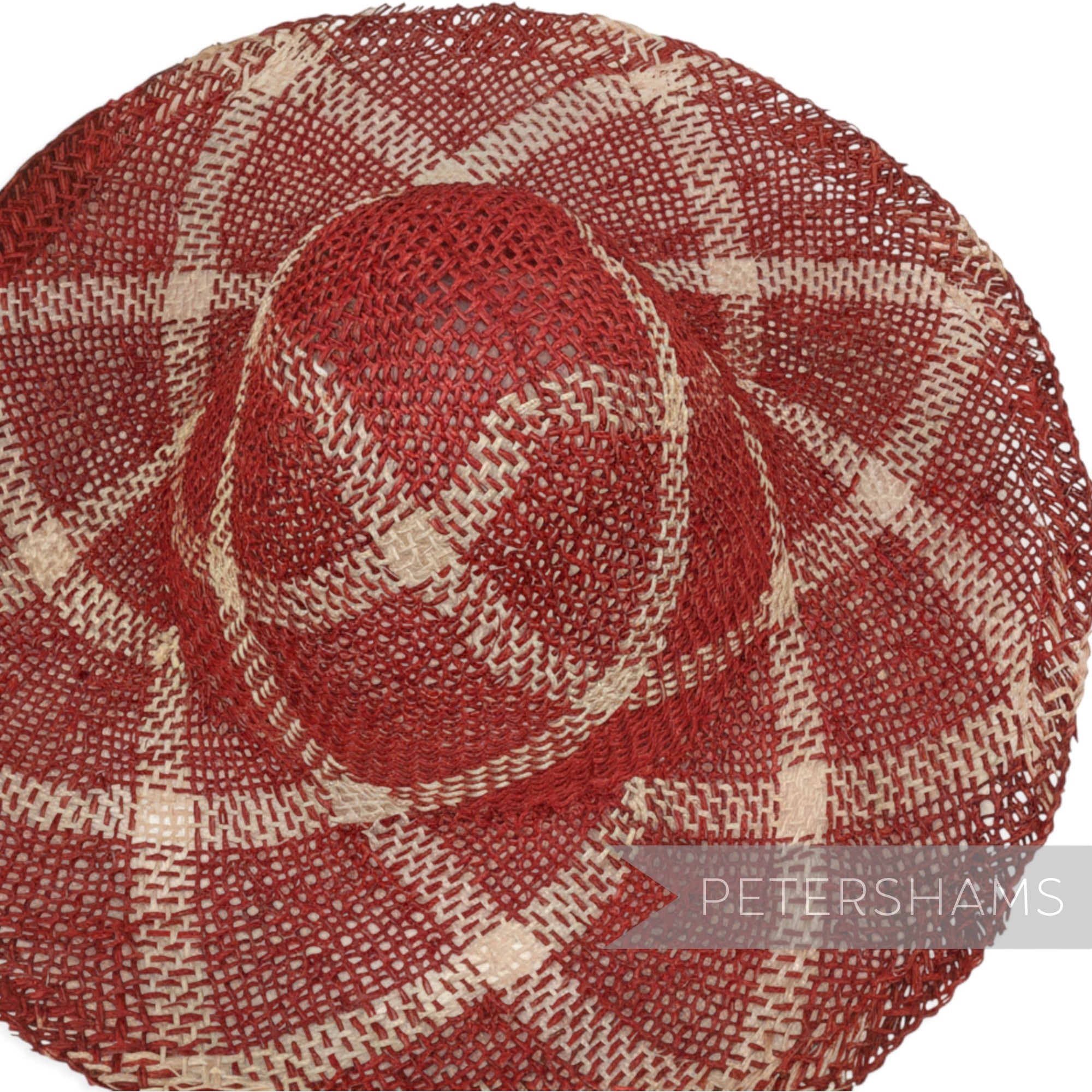 Petershams Millinery Supplies vintage 1990s straw capeline with a red and natural jute roulette curve weave pattern.