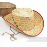 Petershams Millinery Supplies vintage 1950s child size straw cowboy hat with red PVC brim and chin strap
