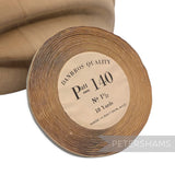 Petershams Millinery Supplies vintage Swiss rayon crepe ribbon roll in tan with Patt 140 label for hat trimming and present wrapping