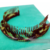 Petershams Millinery Supplies vintage faux tortoise plastic bun comb, 1960s/70s style, flexible for updos or tiaras.