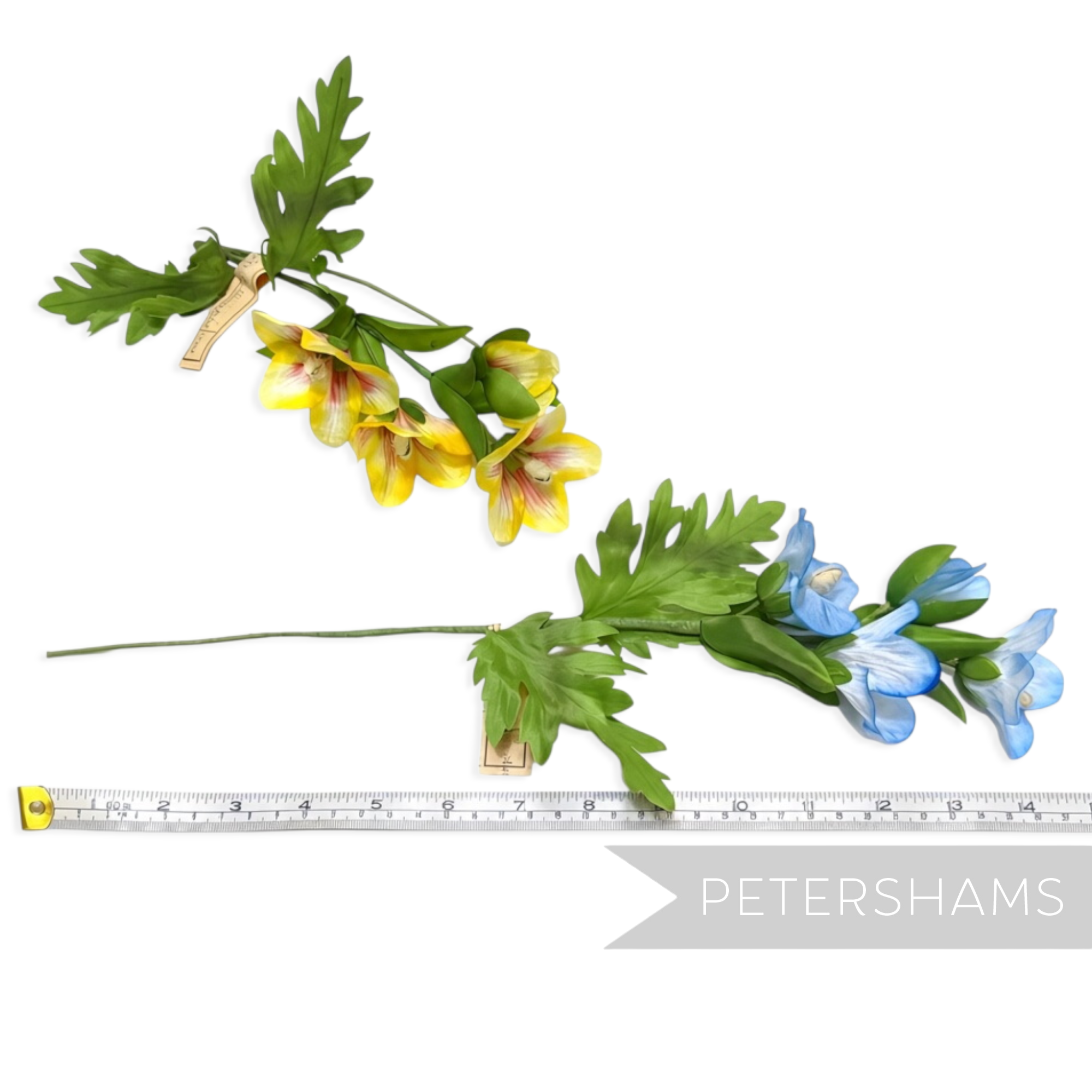 Petershams Millinery Supplies vintage Petra trumpet flower branches in yellow and blue with green wired leaves.