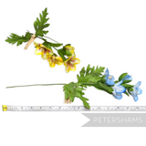Petershams Millinery Supplies vintage Petra trumpet flower branches in yellow and blue with green wired leaves.