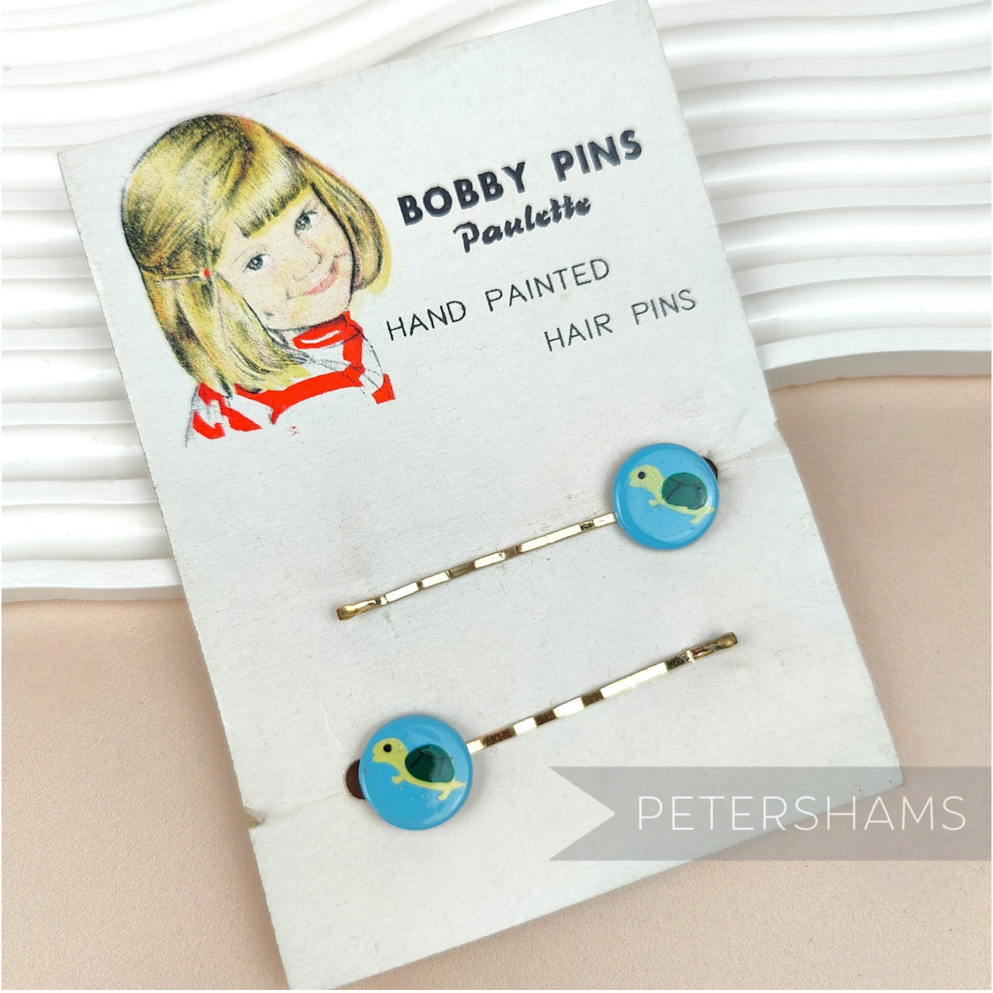 Petershams Millinery Supplies vintage 1960s hand painted turtle hair grips on original illustrated display card