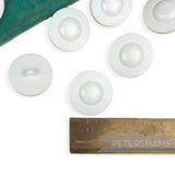 Petershams Millinery Supplies vintage 1960s white plastic UFO style shank buttons with a shiny dome and satin rim.