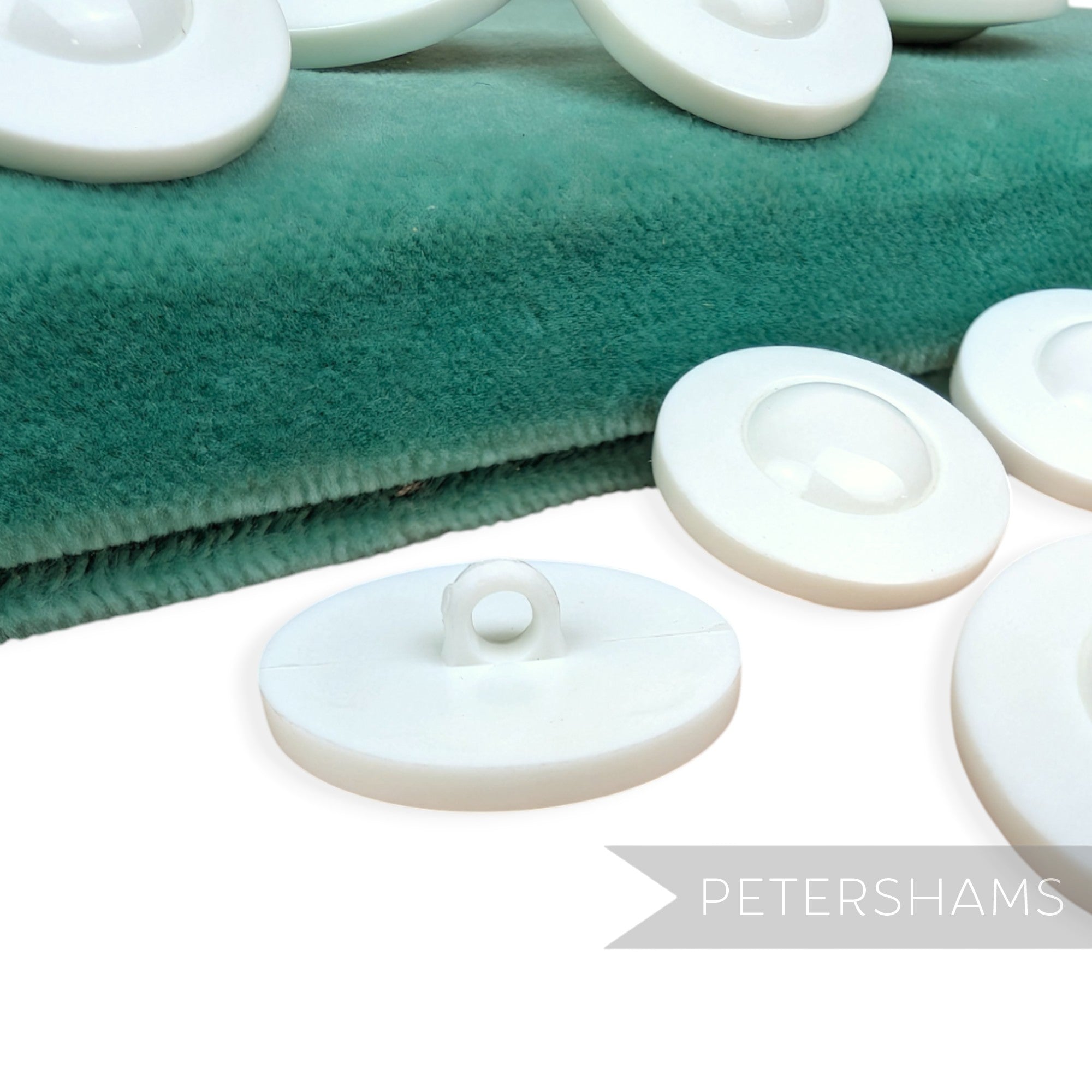 Petershams Millinery Supplies vintage 1960s white plastic UFO style shank buttons with a shiny dome and satin rim