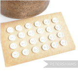 Petershams Millinery Supplies vintage 1940s white 19mm two-hole buttons on an original aged display card