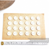 Petershams Millinery Supplies vintage 1940s white 19mm two-hole buttons on an aged paper card