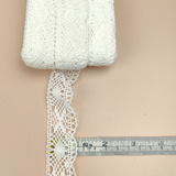 Petershams Millinery Supplies vintage white 1950s fine lace trim with cross and eye pattern, 25mm wide.