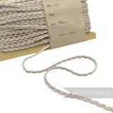 Petershams Millinery Supplies vintage 1950s silky white Russia braid trim on a 12m card for hat and jewelry making.