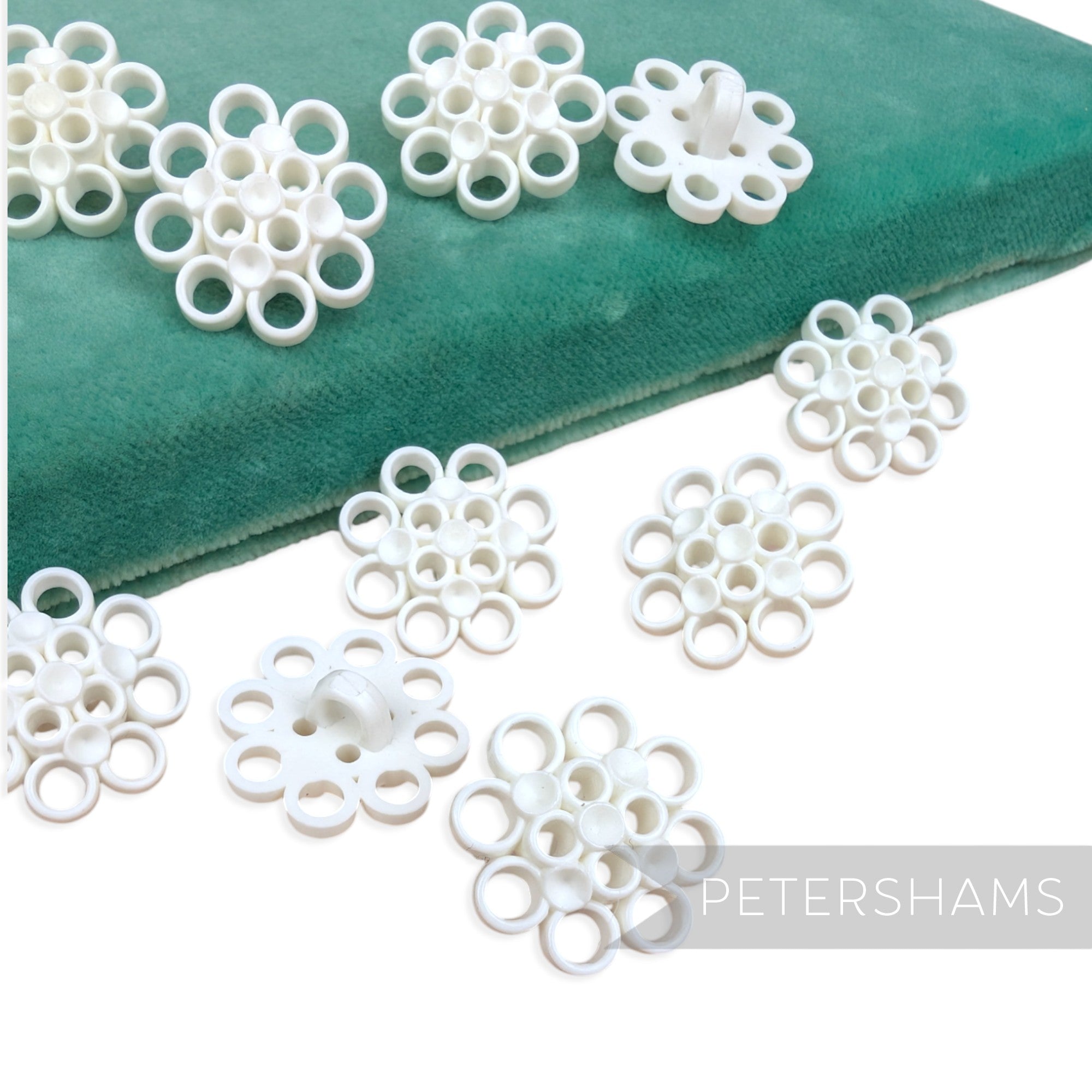 Petershams Millinery Supplies vintage 1960s white plastic circular pattern shank buttons for hats and fascinators