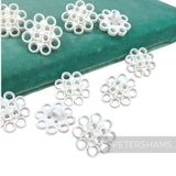 Petershams Millinery Supplies vintage 1960s white plastic circular pattern shank buttons for hats and fascinators