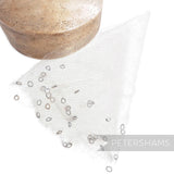 Petershams Millinery Supplies vintage white honeycomb veiling round with chenille circle details on a wooden block